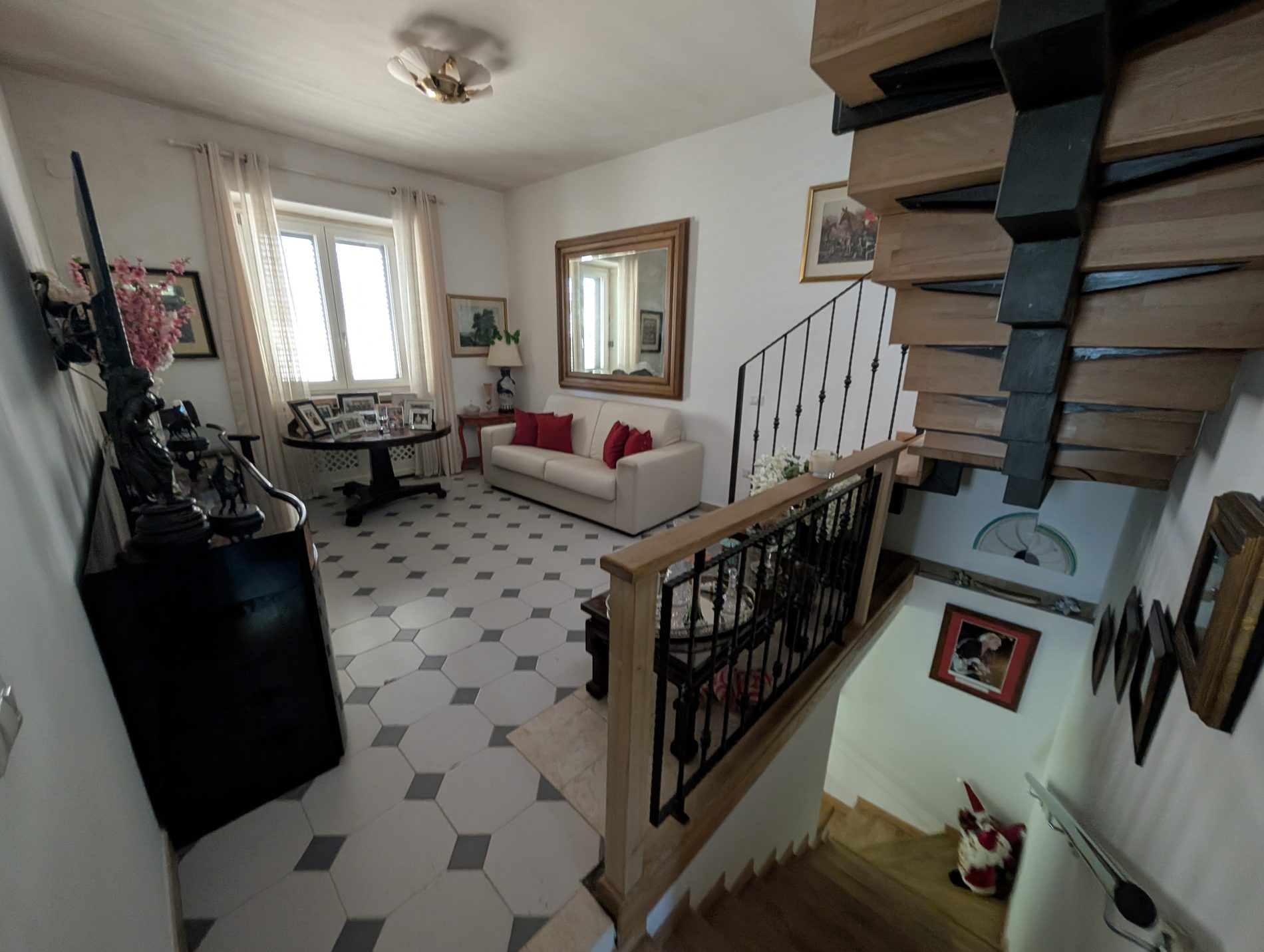 Second reception room with oak staircase