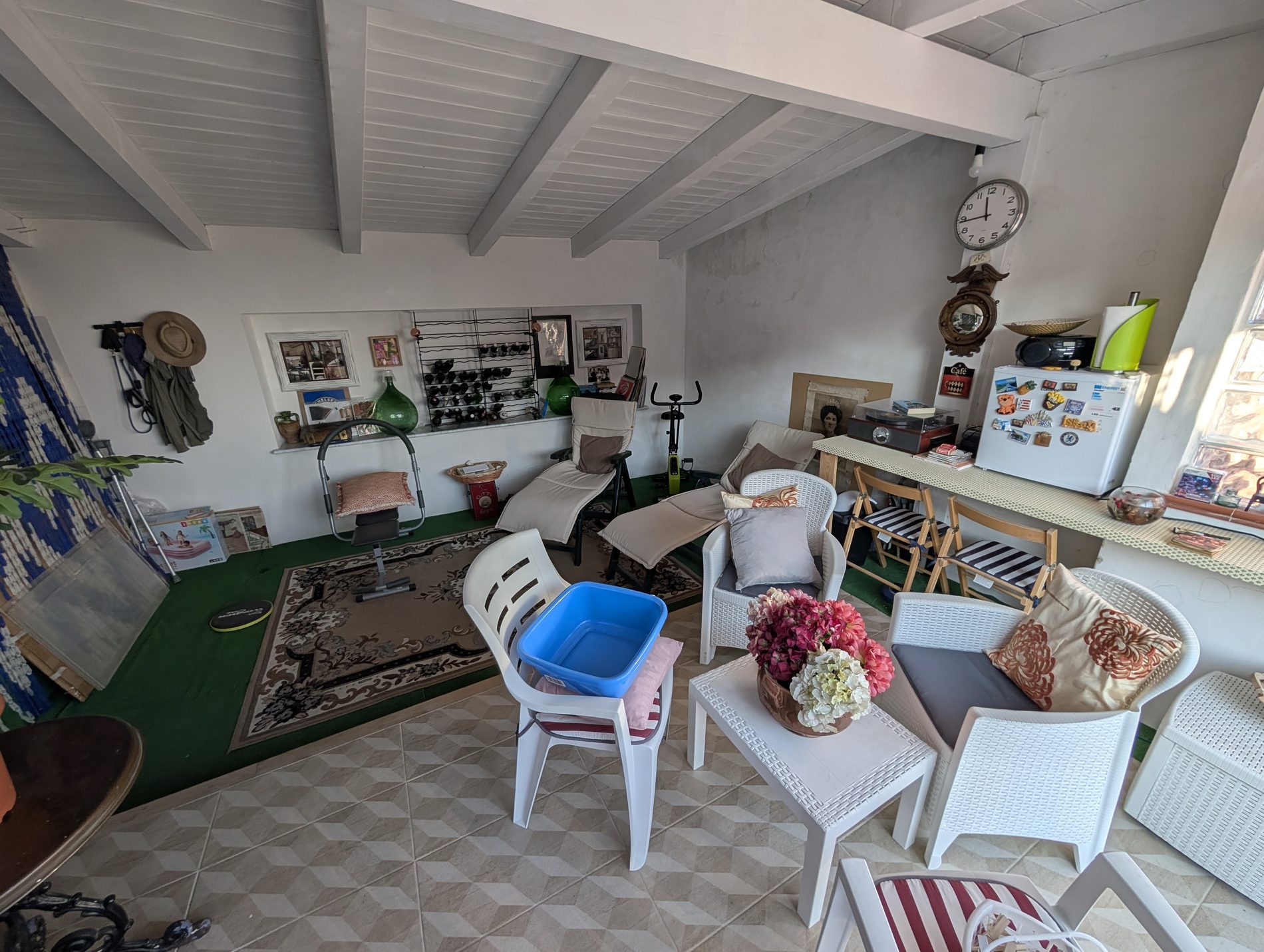 Covered terrace room used for storage and shade